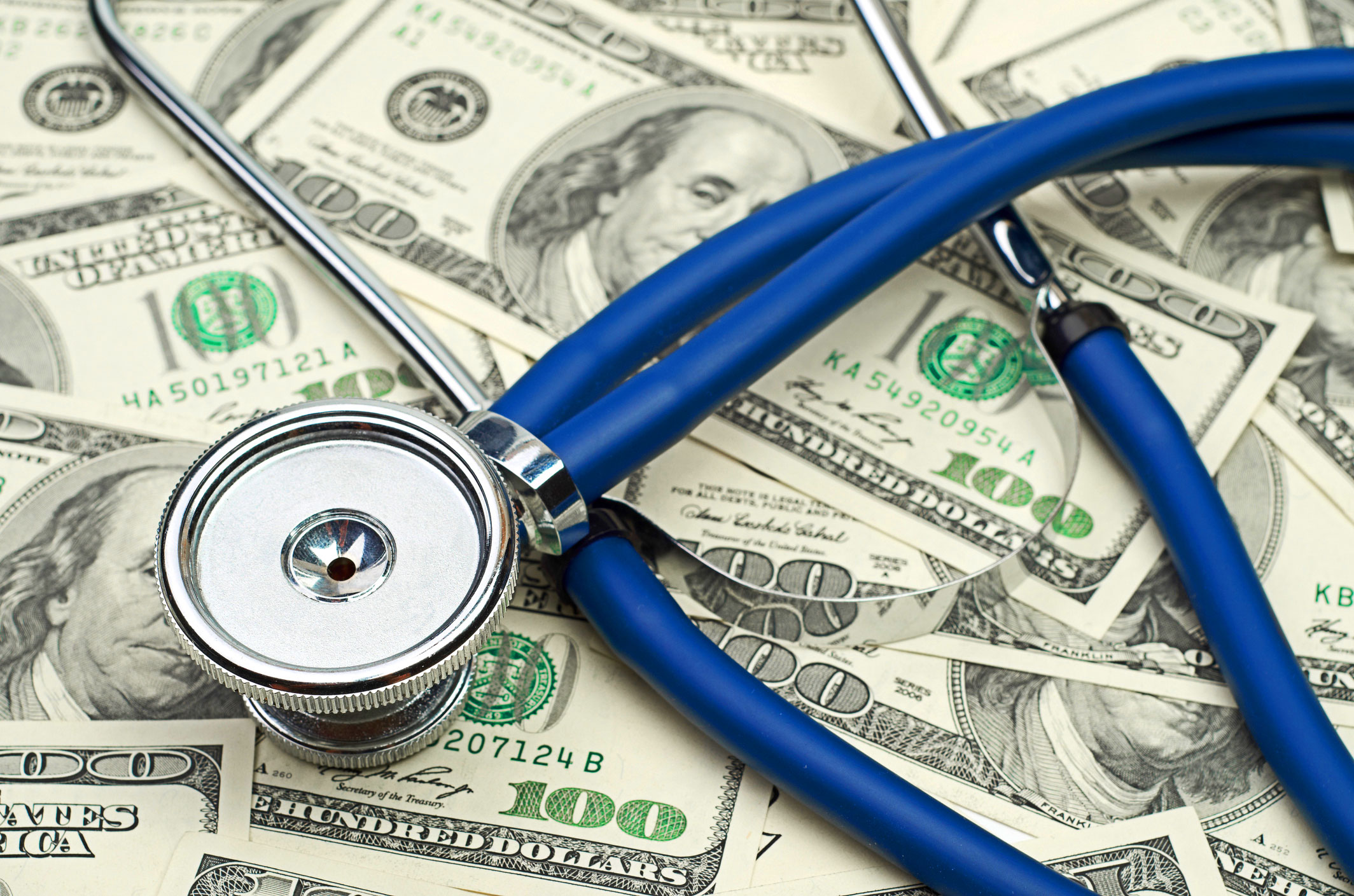 Heap-of-dollars-with-stethoscope