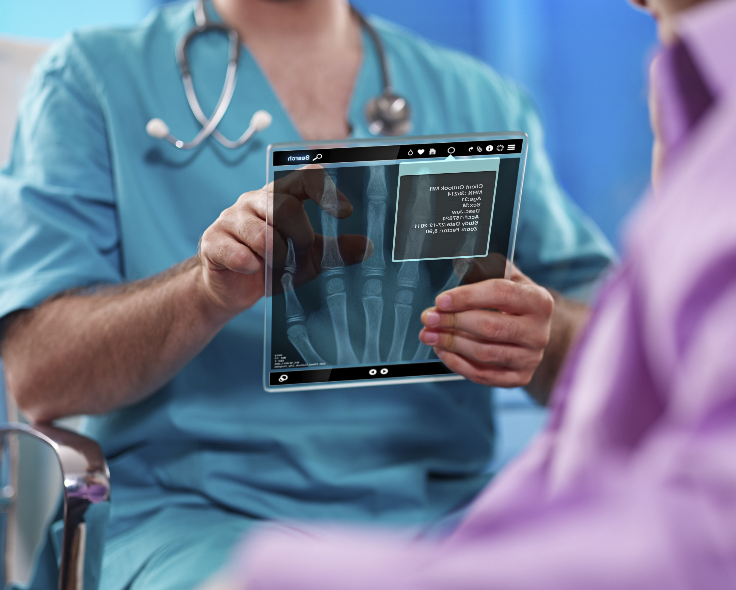 Doctor_with_digital_tablet_x-ray
