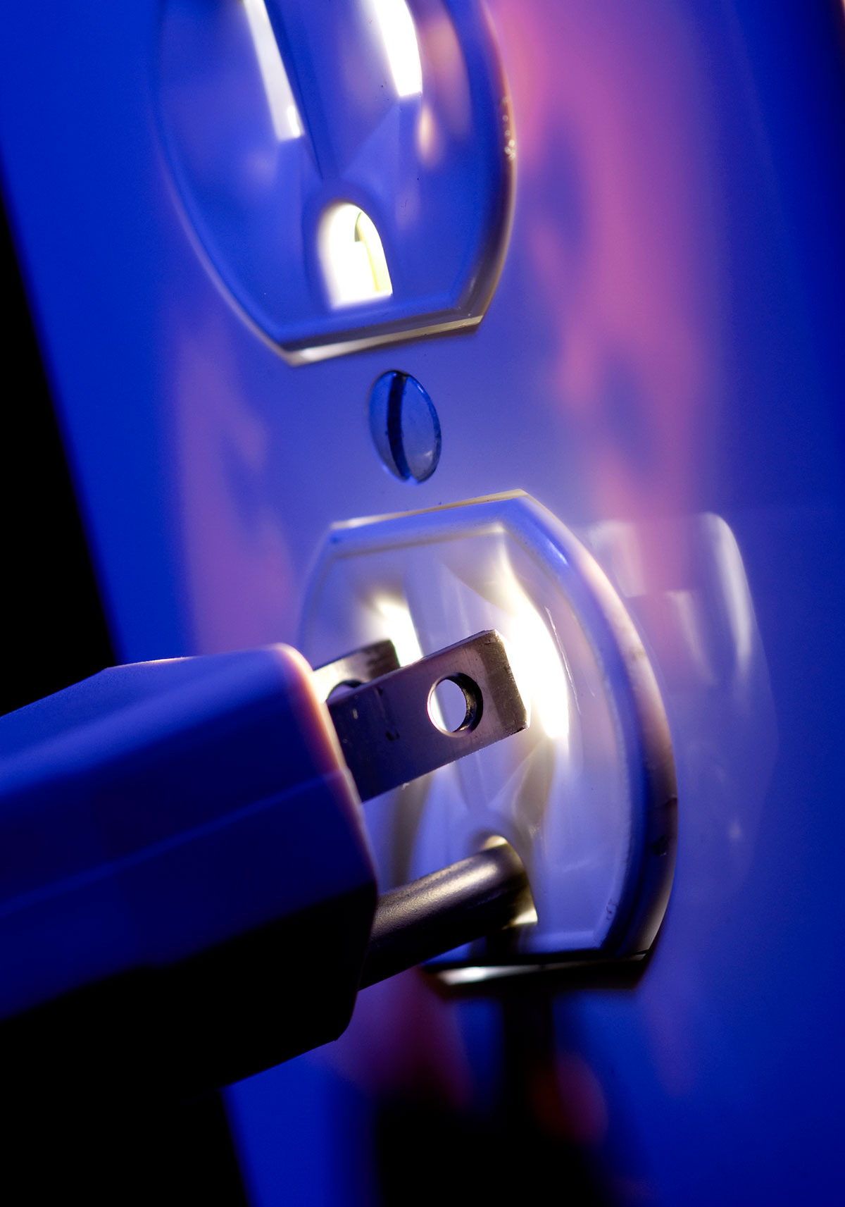 Electric-Outlet-Glowing-with-Plug