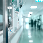 IV-Drip-with-Hospital-Corridor-Background